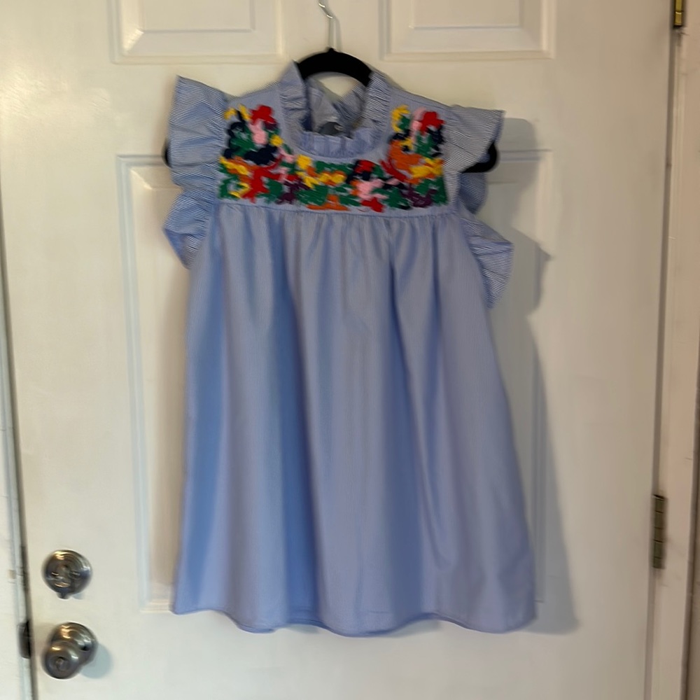 Ruffled neck and sleeves - new without tags never worn